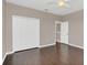 Bright bedroom with hardwood floors and large closet at 8795 Ribault Ave, Orlando, FL 32832