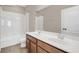 Bathroom with double vanity, tub, and shower at 8795 Ribault Ave, Orlando, FL 32832