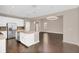 Open concept kitchen with island, granite countertops, and stainless steel appliances at 8795 Ribault Ave, Orlando, FL 32832