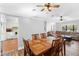 Open dining area adjacent to the kitchen and living room at 2500 Cherry Blossom Ct, Eustis, FL 32726