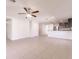 Spacious living room with tile floors and ceiling fan at 207 Goldenrod Ln, Kissimmee, FL 34759