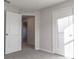Bedroom with carpet, neutral walls and two closets at 207 Goldenrod Ln, Kissimmee, FL 34759