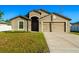 Newly built home with two-car garage at 207 Goldenrod Ln, Kissimmee, FL 34759
