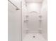 Clean and bright shower stall with built in shelving at 207 Goldenrod Ln, Kissimmee, FL 34759