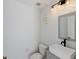 Modern powder room with a sleek floating vanity and updated fixtures at 558 Cadiz Loop, Davenport, FL 33837