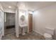 Bathroom features pedestal sink, walk-in shower, and toilet at 7129 Oakwind Dr, Orlando, FL 32818