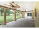 Covered patio with ceiling fans, ideal for outdoor relaxation at 7129 Oakwind Dr, Orlando, FL 32818