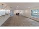 Spacious dining room with large table and chandelier at 7129 Oakwind Dr, Orlando, FL 32818