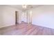 Bright bedroom with vinyl plank flooring and access to closets and bathroom at 231 Begonia Ln, Kissimmee, FL 34759