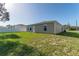 Property features a spacious backyard at 231 Begonia Ln, Kissimmee, FL 34759