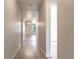 Bright hallway with wood-look flooring at 231 Begonia Ln, Kissimmee, FL 34759