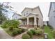 Two-story house with stone accents and a walkway at 11807 Fiction Ave, Orlando, FL 32832