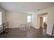 Bright living room with hardwood floors and access to other rooms at 11807 Fiction Ave, Orlando, FL 32832