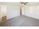 Spacious bedroom with ensuite bathroom and ample closet space at 908 Perkins St, Leesburg, FL 34748