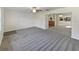 Spacious living room with open floor plan at 908 Perkins St, Leesburg, FL 34748