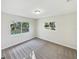 Bright bedroom with new carpet and large windows at 908 Perkins St, Leesburg, FL 34748
