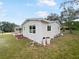 Side view of the house showcasing exterior updates at 908 Perkins St, Leesburg, FL 34748