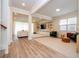 Open living area with hardwood floors and ample natural light at 5653 Oak Knoll Dr, St Cloud, FL 34771