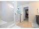 Clean bathroom with a walk-in shower and built-in bench at 5653 Oak Knoll Dr, St Cloud, FL 34771