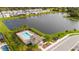 Community pool and clubhouse by the lake at 5653 Oak Knoll Dr, St Cloud, FL 34771