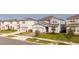 Two-story house in a neighborhood of similar homes at 5653 Oak Knoll Dr, St Cloud, FL 34771