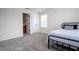 Small bedroom with a twin bed and an adjacent bathroom at 5653 Oak Knoll Dr, St Cloud, FL 34771