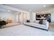 Spacious living area showcasing an open floor plan and a view into the kitchen at 5653 Oak Knoll Dr, St Cloud, FL 34771