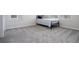 Simple bedroom with a twin bed and neutral color scheme at 5653 Oak Knoll Dr, St Cloud, FL 34771