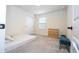 Cozy bedroom with a comfortable bed and built-in closet at 5653 Oak Knoll Dr, St Cloud, FL 34771