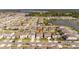 Aerial view of a house and neighborhood, showcasing its location at 5653 Oak Knoll Dr, St Cloud, FL 34771