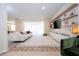 Modern living room with a built-in entertainment center at 5653 Oak Knoll Dr, St Cloud, FL 34771