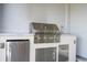 Stainless steel grill with built-in sink and storage at 5653 Oak Knoll Dr, St Cloud, FL 34771
