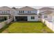 Spacious backyard with screened patio and fenced perimeter at 5653 Oak Knoll Dr, St Cloud, FL 34771