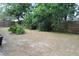Large backyard with a wooden privacy fence at 4663 Montauk St, Orlando, FL 32808