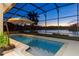 Evening view of the pool and patio area at 5094 Otters Den Trl, Sanford, FL 32771