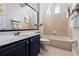 Clean bathroom with bathtub, toilet, and vanity at 5094 Otters Den Trl, Sanford, FL 32771