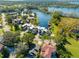 Aerial view of the community and surrounding waterfront area at 8984 Houston Pl # 103, Orlando, FL 32819