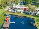 Aerial view of property showing location on the lake with private boat slip at 8984 Houston Pl # 103, Orlando, FL 32819