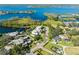 An expansive aerial view of the property and its lakefront setting at 8984 Houston Pl # 103, Orlando, FL 32819
