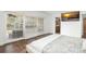 Spacious bedroom with water views, tiled floors and large sliding doors at 8984 Houston Pl # 103, Orlando, FL 32819