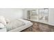 Bright bedroom with tiled floors and sliding doors leading to a patio at 8984 Houston Pl # 103, Orlando, FL 32819