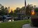 Private boat dock with gazebo at sunset at 8984 Houston Pl # 103, Orlando, FL 32819