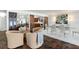Elegant dining room with glass table and comfortable seating at 8984 Houston Pl # 103, Orlando, FL 32819