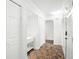 Bright and airy entryway with tiled floors and ample closet space at 8984 Houston Pl # 103, Orlando, FL 32819