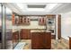 Modern kitchen with stainless steel appliances and granite countertops at 8984 Houston Pl # 103, Orlando, FL 32819