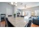 Spacious dining area with large table and access to living room at 8581 Bay Lilly Loop, Kissimmee, FL 34747