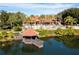 Gazebo on a lake in front of community clubhouse at 8581 Bay Lilly Loop, Kissimmee, FL 34747