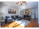 Comfortable living room with a sectional sofa and large TV at 8581 Bay Lilly Loop, Kissimmee, FL 34747