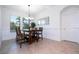 Bright dining area with a rectangular wooden table and chairs at 10386 Atwater Bay Dr, Winter Garden, FL 34787