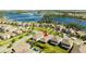 Aerial view of community featuring lake, homes, and landscape at 10386 Atwater Bay Dr, Winter Garden, FL 34787